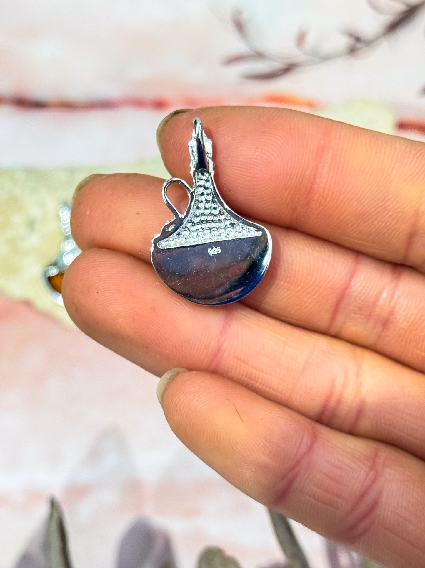 Lasered Genie Amber Pendants
