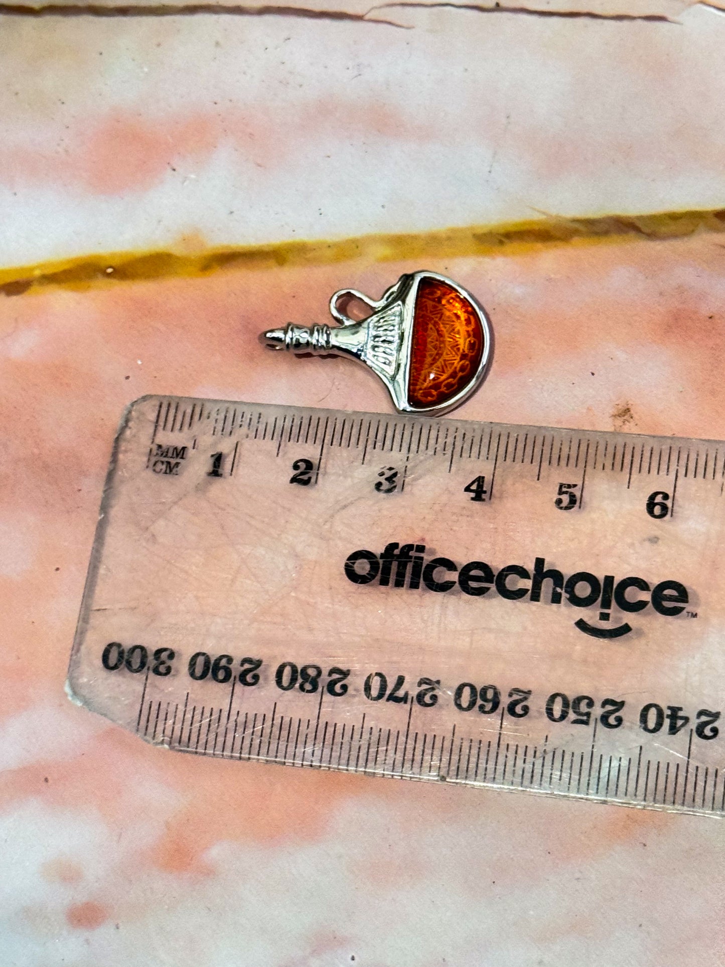Lasered Genie Amber Pendants