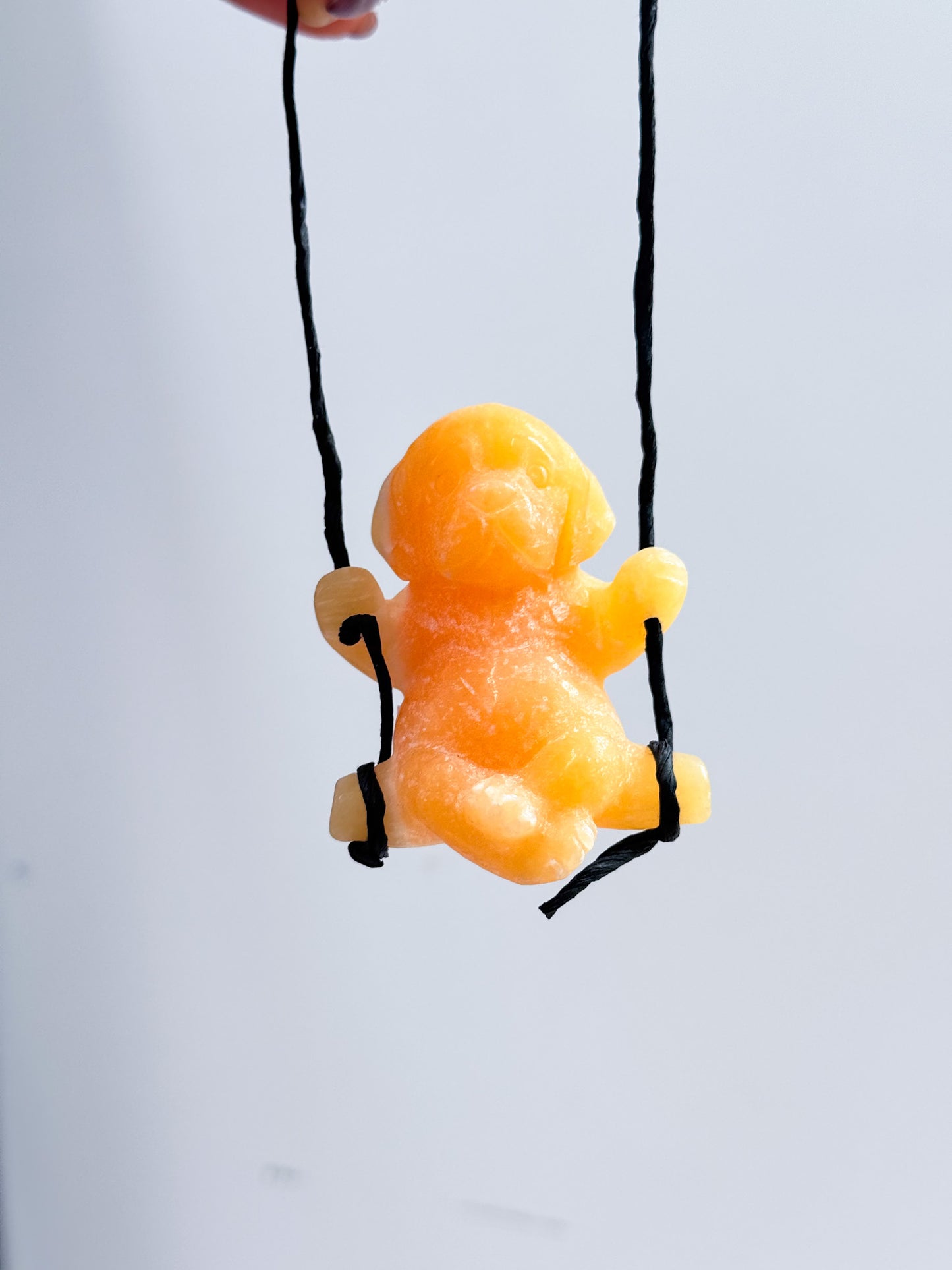 Swinging Dog Carvings