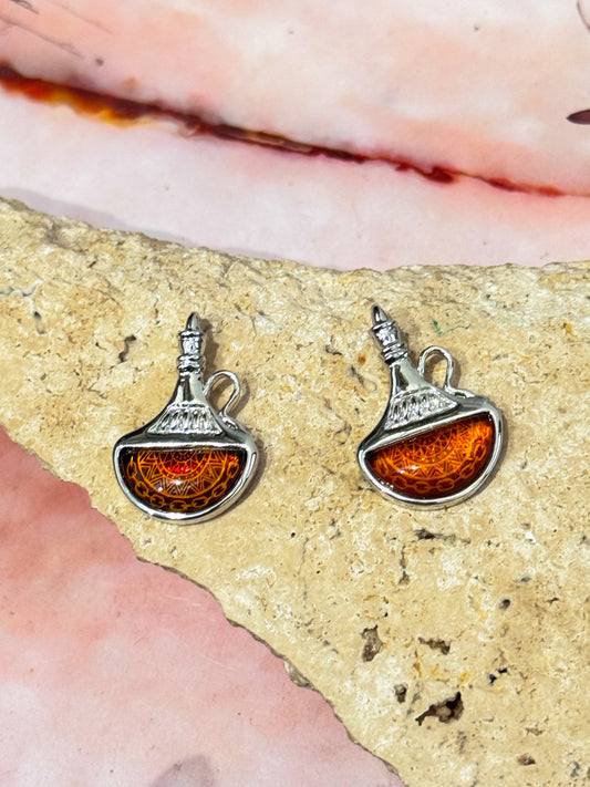 Lasered Genie Amber Pendants