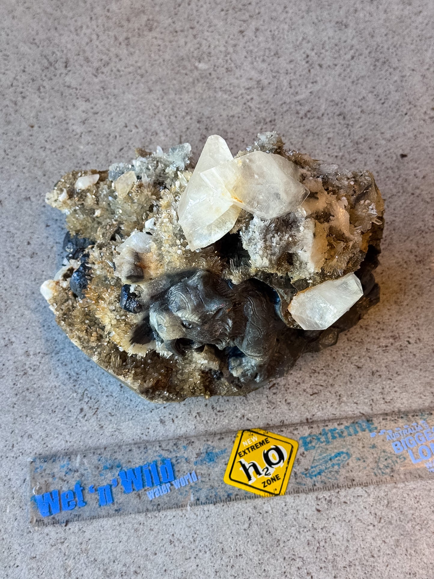 Sabertooth Tiger in Calcite and Quartz Cluster Carving