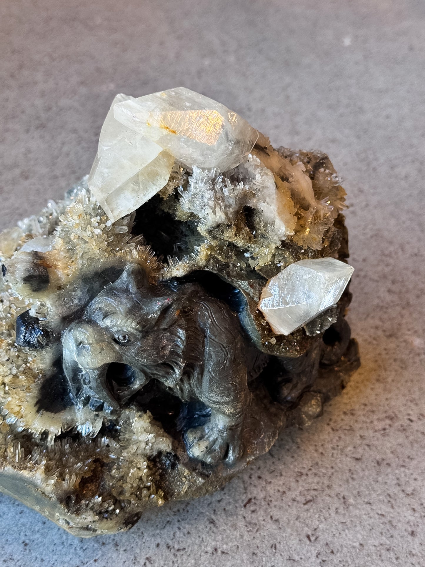Sabertooth Tiger in Calcite and Quartz Cluster Carving