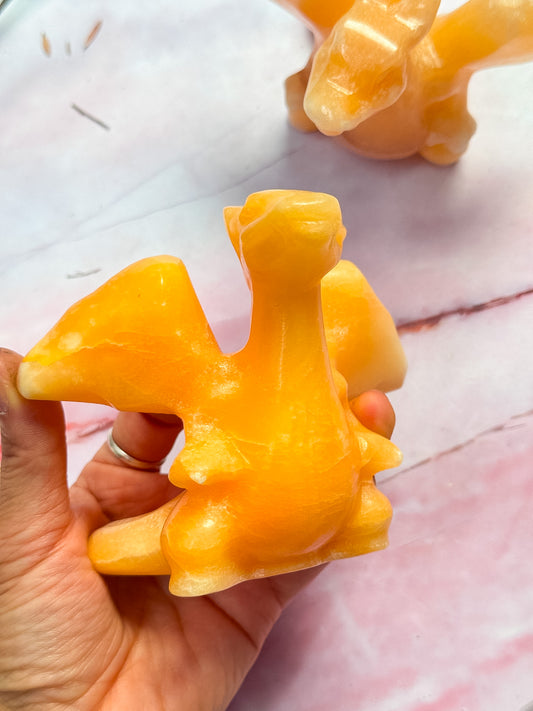 Yellow Calcite Charizard Carvings