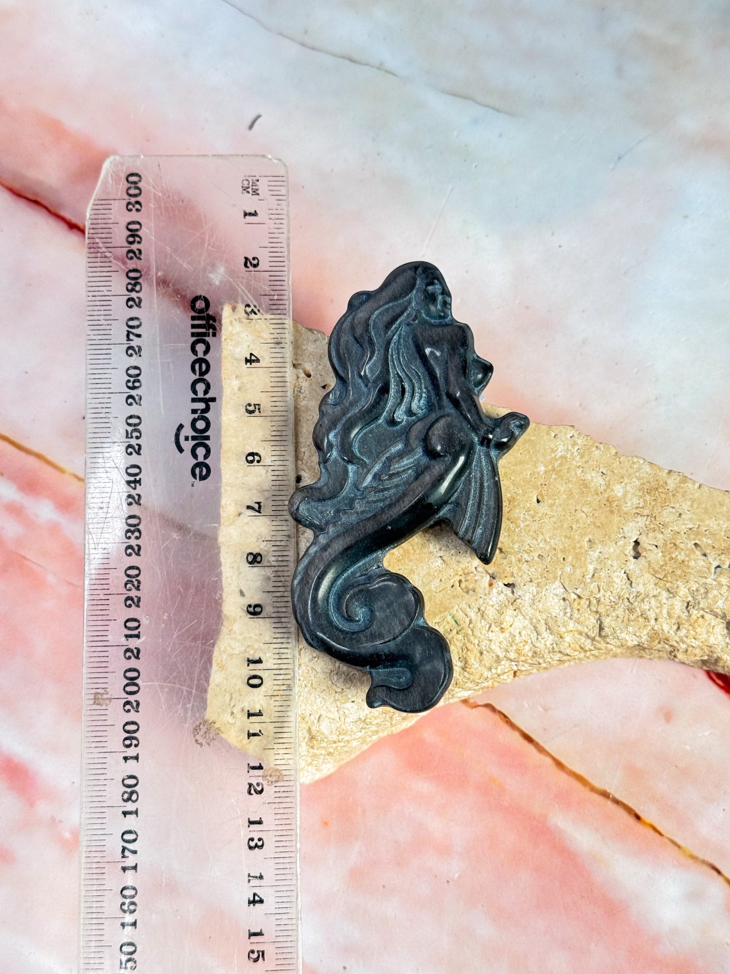Obsidian Mermaid Carvings