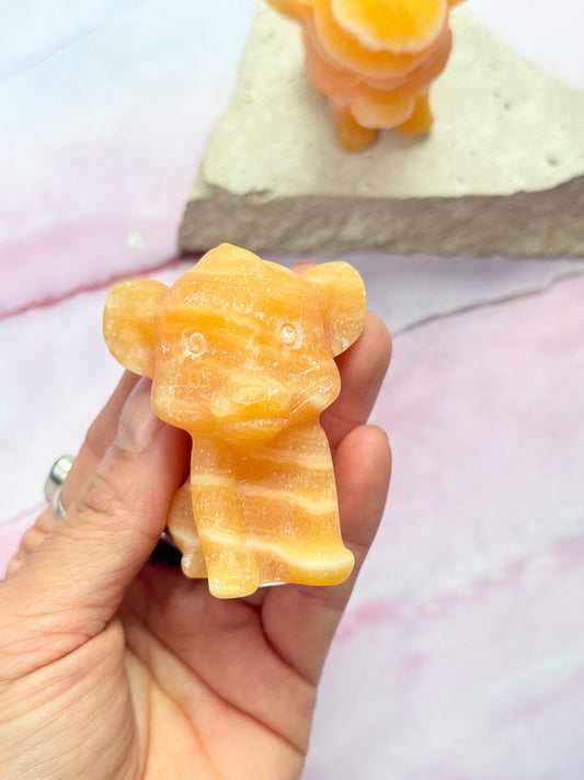 Orange Calcite Simba Carvings
