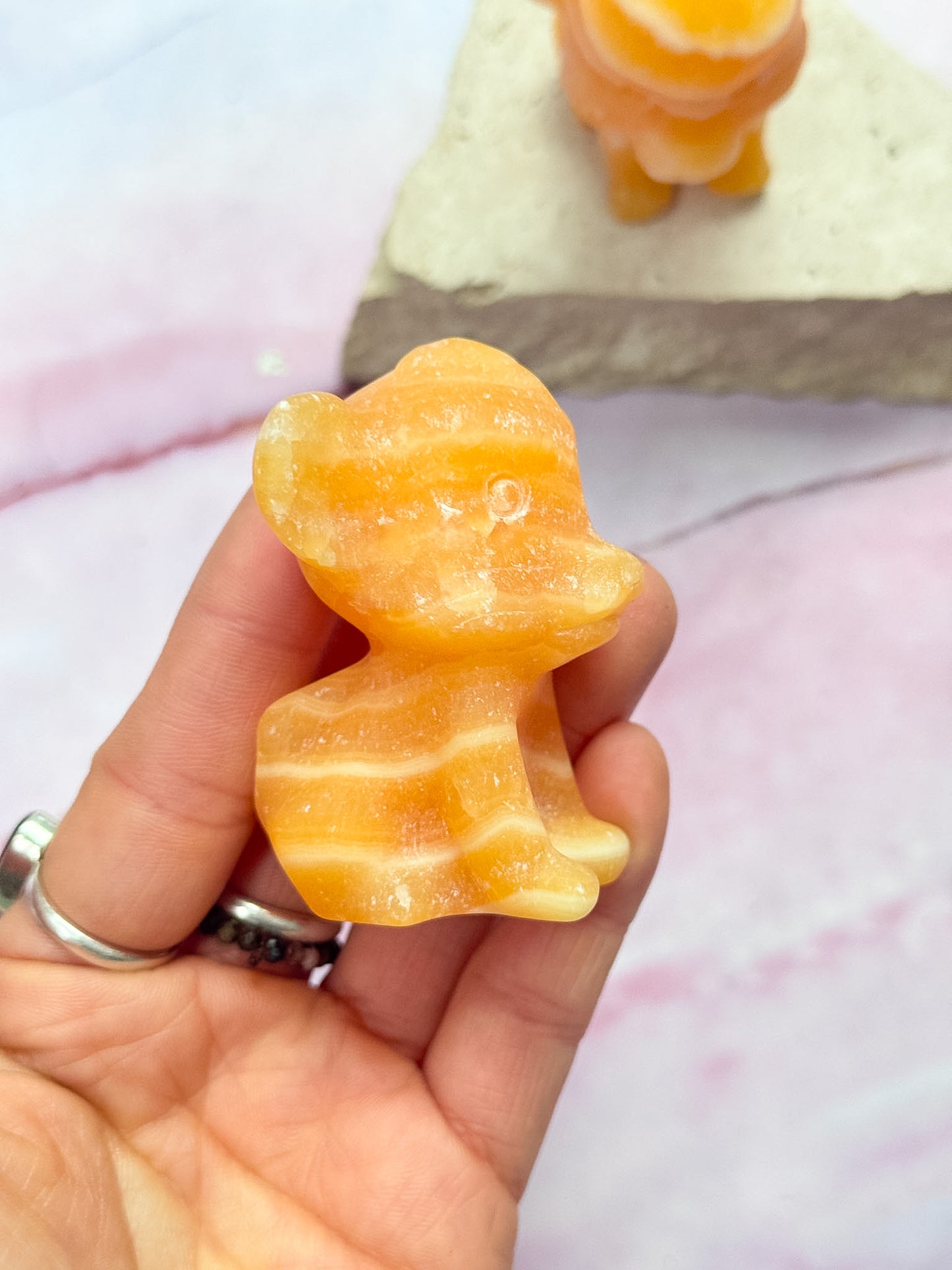 Orange Calcite Simba Carvings