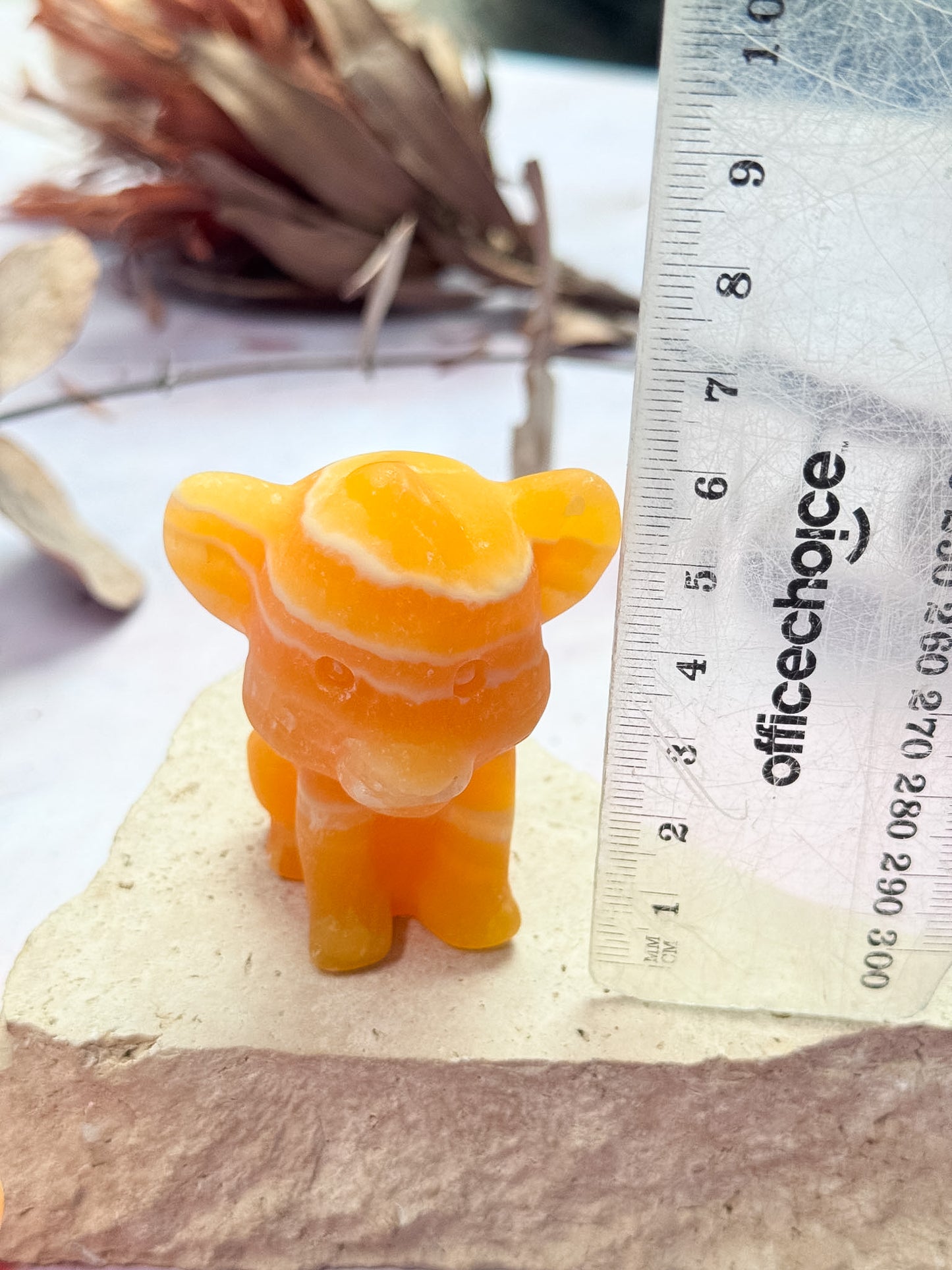 Orange Calcite Simba Carvings