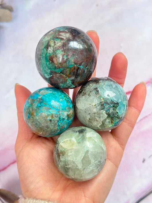 Chrysocolla in Quartz Spheres