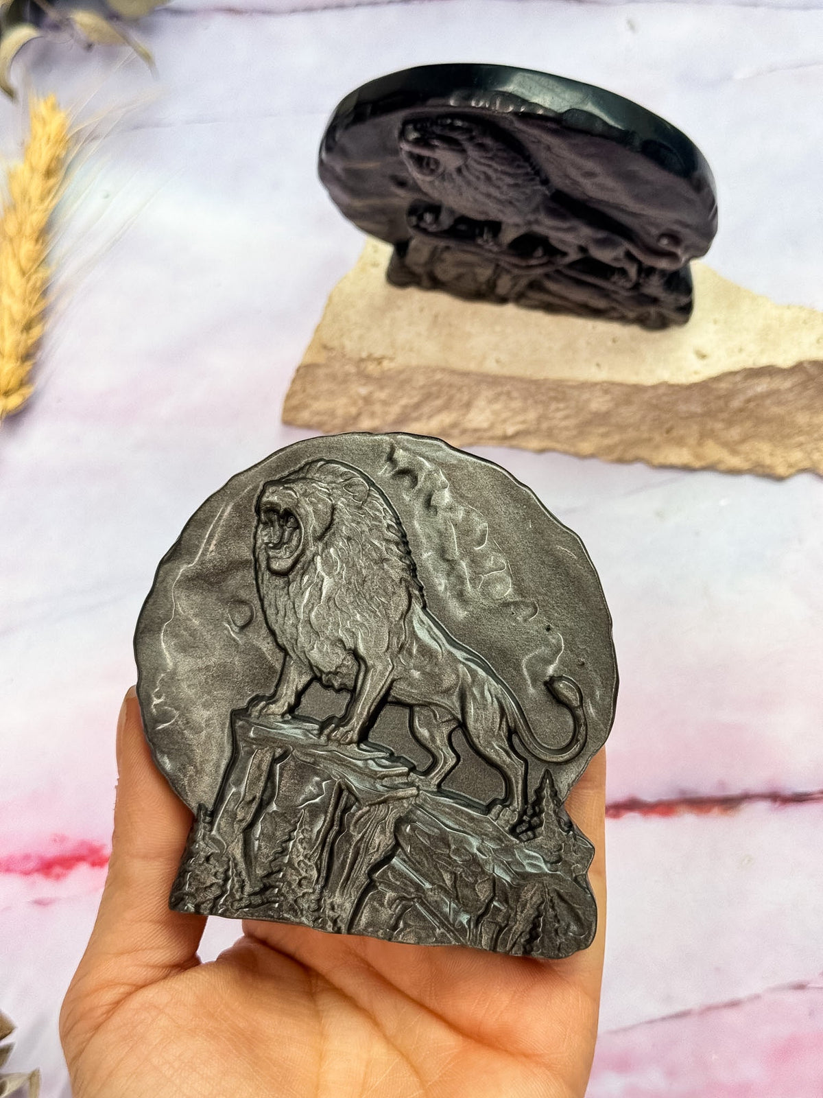 Silver Sheen Obsidian Lion Carvings