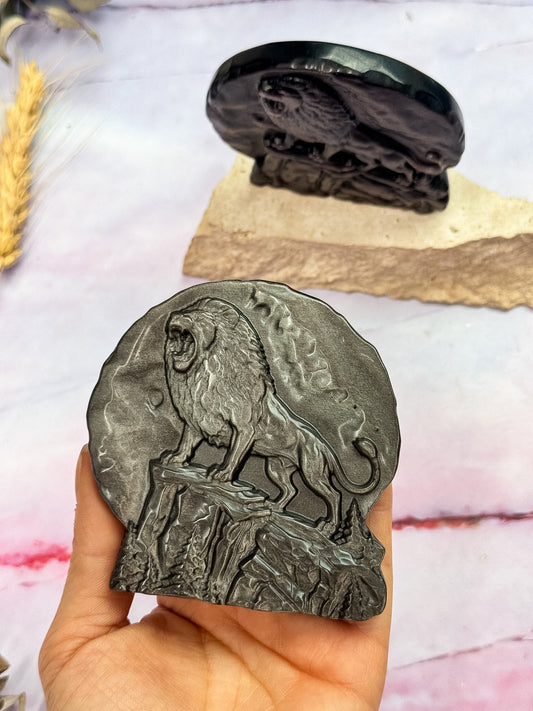 Silver Sheen Obsidian Lion Carvings