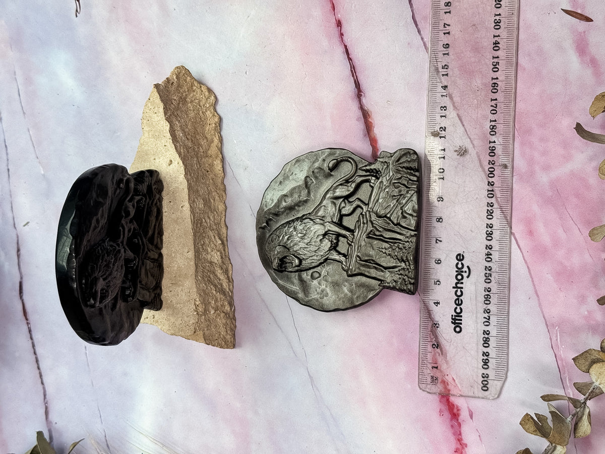 Silver Sheen Obsidian Lion Carvings